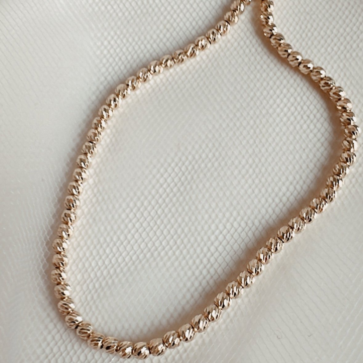 ob111 Pulsera oro 18k bolitas texturadas