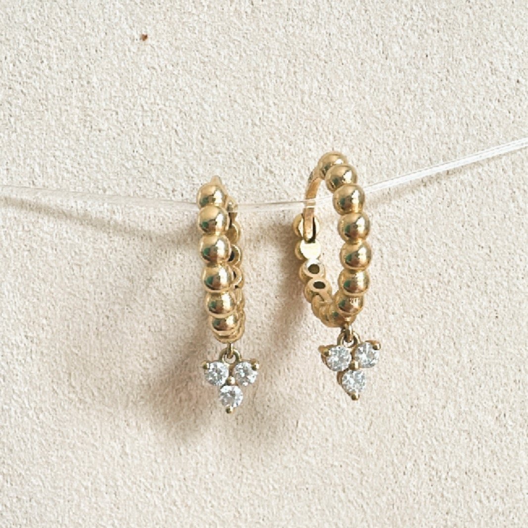 Aros caravana oro 18 kt y 3 brillantes