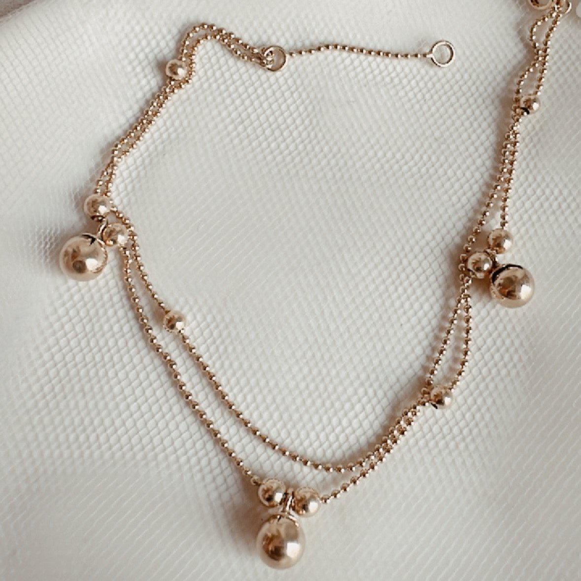 ob104 Pulsera doble oro 18k con dijes