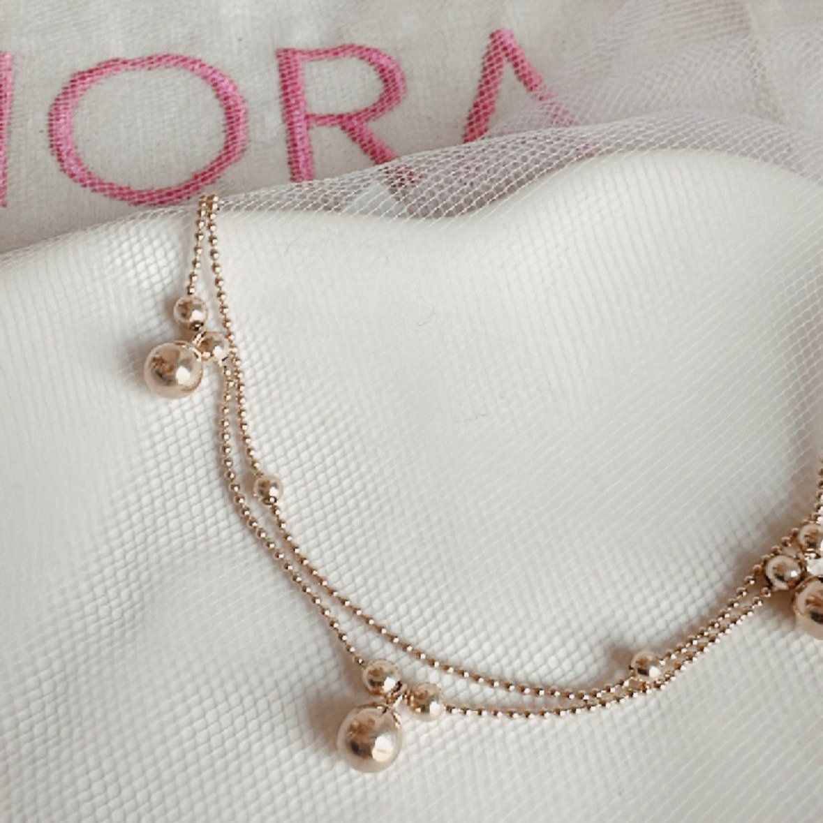 ob104 Pulsera doble oro 18k con dijes