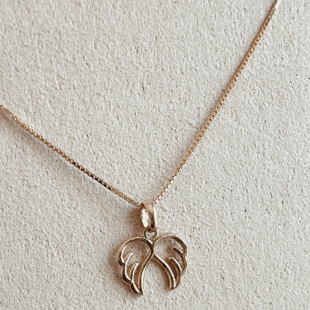 Cadena oro18k con dije alitas angel