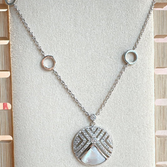 Cadena + dije nácar con aros
