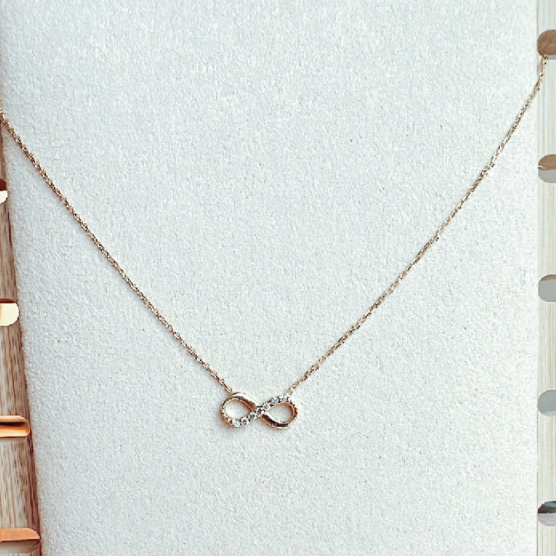 os112 Cadena oro18k con dije infinito