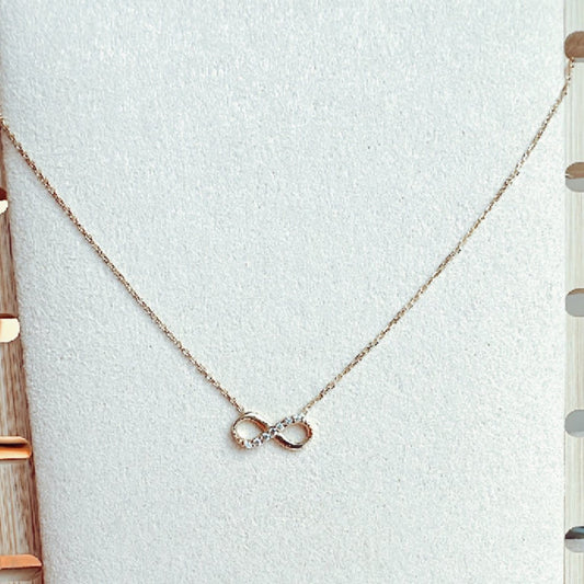 os112 Cadena oro18k con dije infinito