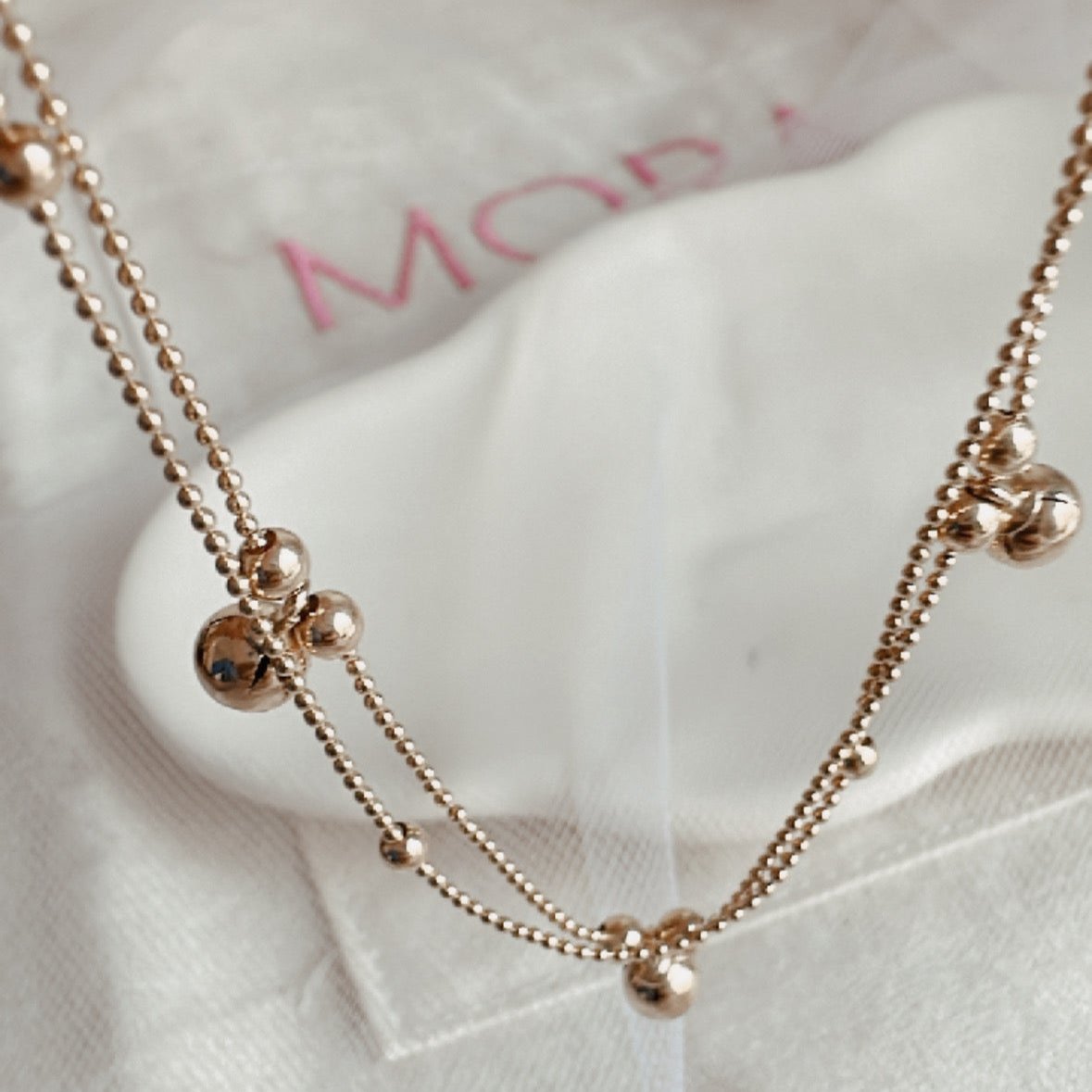 ob104 Pulsera doble oro 18k con dijes