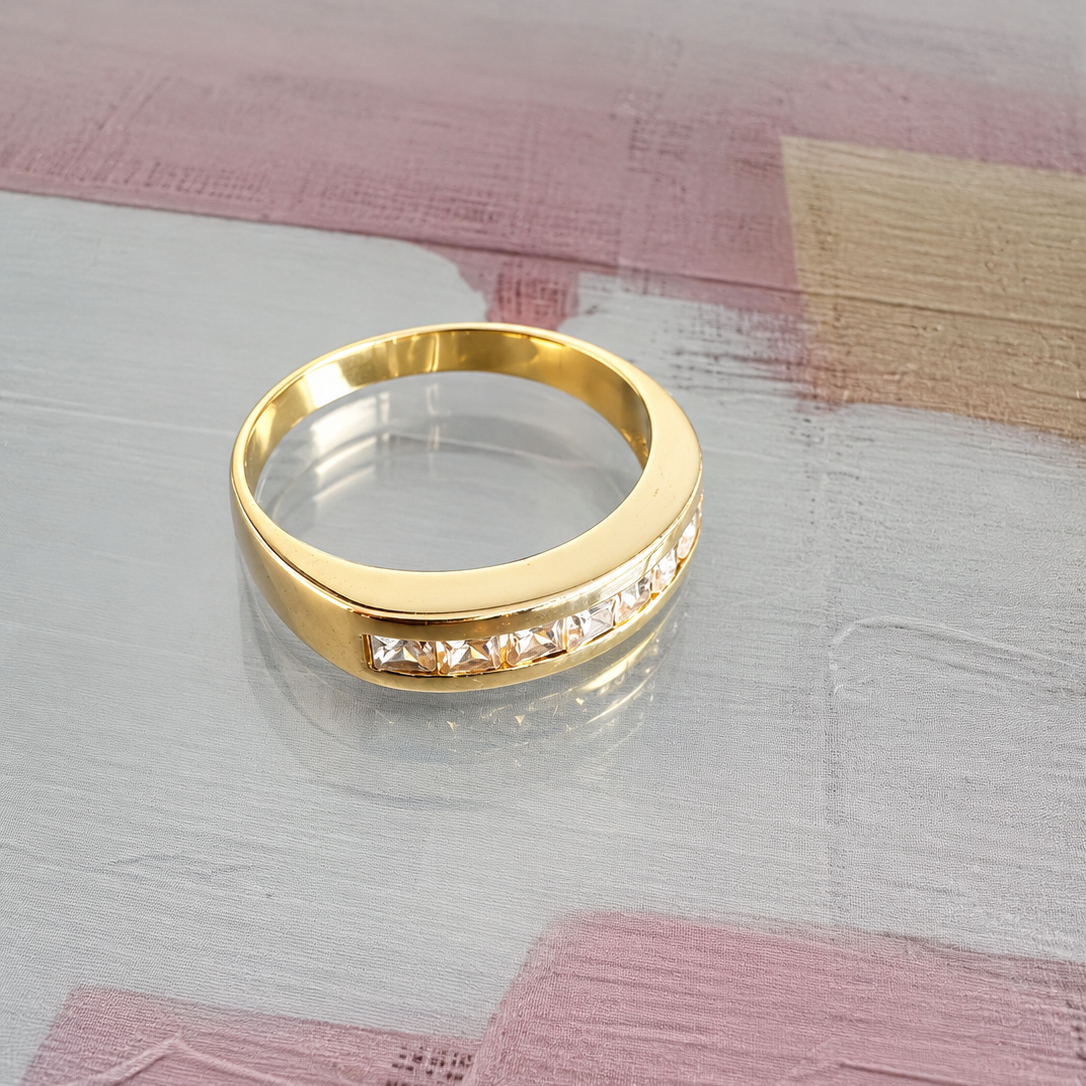18k004 - Anillo de oro 18K con topacios
