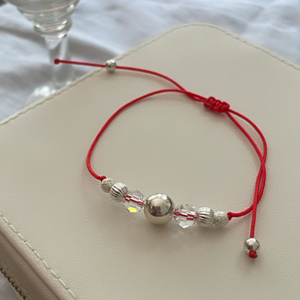 Pulsera hilo rojo con plata y cristales swarovski