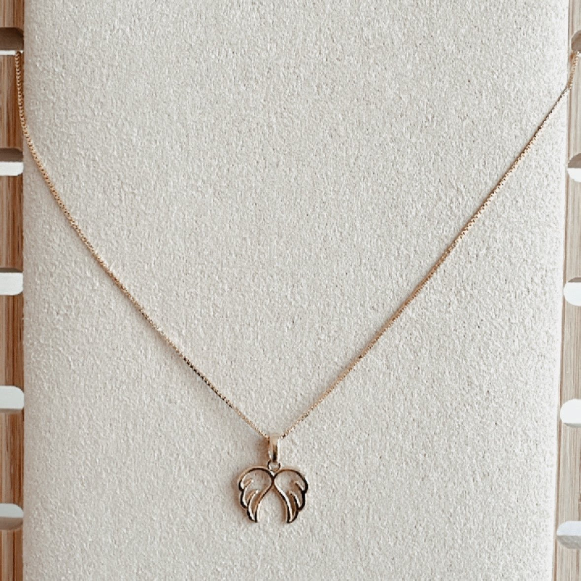 Cadena oro18k con dije alitas angel