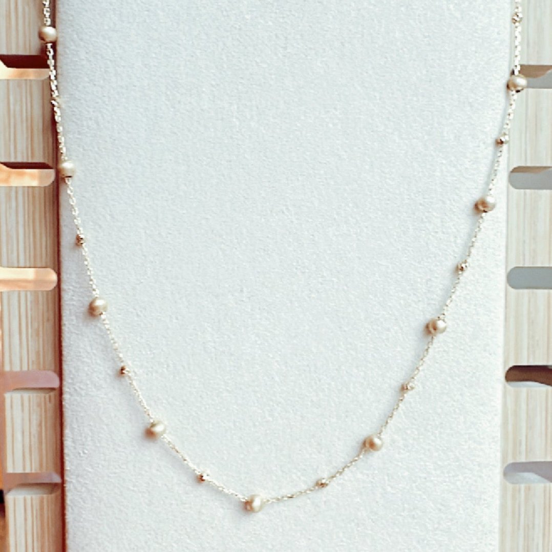 os103 Cadena oro18k con bolitas equidistantes