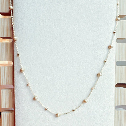 os103 Cadena oro18k con bolitas equidistantes