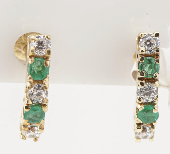 Caravana medio aro oro 18k esmeraldas y circonias.